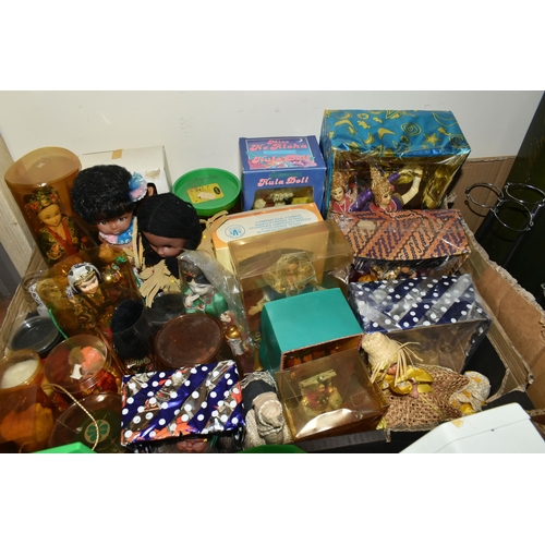 513 - FOUR BOXES OF TOYS AND SOUVENIR DOLLS, to include six Palitoy 'Pocketeers' games, a collection of tr... 