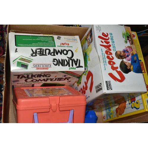 513 - FOUR BOXES OF TOYS AND SOUVENIR DOLLS, to include six Palitoy 'Pocketeers' games, a collection of tr... 