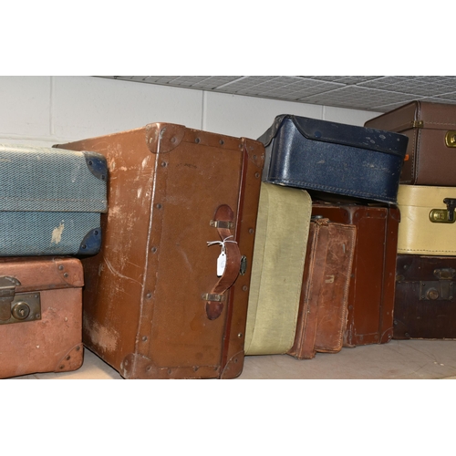 515 - A GROUP OF TEN VINTAGE SUITCASES, comprising maker's names Everwear and Revelation, two brown 1940's... 