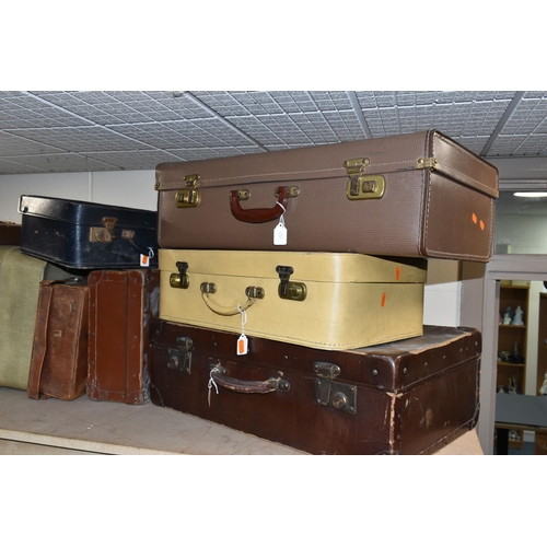 515 - A GROUP OF TEN VINTAGE SUITCASES, comprising maker's names Everwear and Revelation, two brown 1940's... 