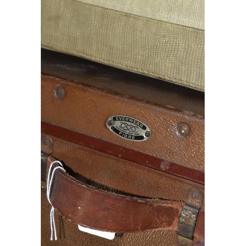 515 - A GROUP OF TEN VINTAGE SUITCASES, comprising maker's names Everwear and Revelation, two brown 1940's... 