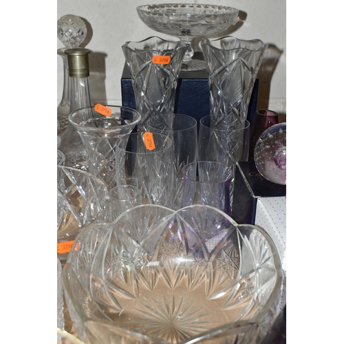 517 - A COLLECTION OF GLASSWARE, comprising three boxed Caithness glass paperweights, an amethyst glass va... 