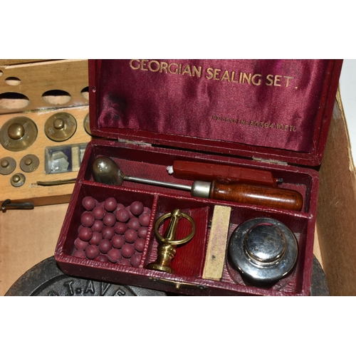 531 - A BOX OF WEIGHTS, SEALING SET AND A PRESSED FLOWER SOUVENIR ALBUM, comprising a fitted wooden case o... 