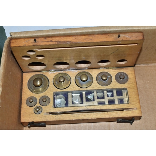 531 - A BOX OF WEIGHTS, SEALING SET AND A PRESSED FLOWER SOUVENIR ALBUM, comprising a fitted wooden case o... 