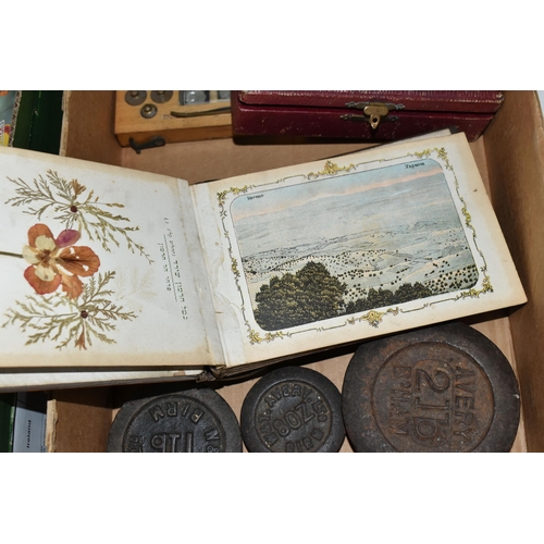 531 - A BOX OF WEIGHTS, SEALING SET AND A PRESSED FLOWER SOUVENIR ALBUM, comprising a fitted wooden case o... 