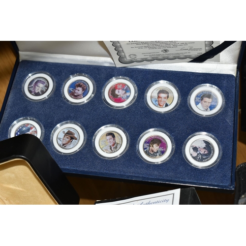 539 - A COLLECTION OF ELVIS MEMORABILIA, including approximately sixty badges within a stained pine frame,... 