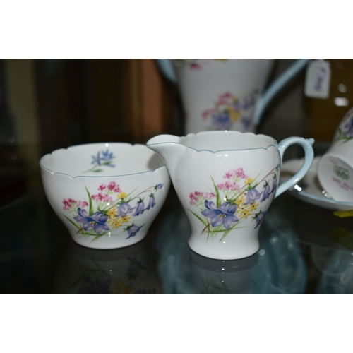 562 - A SHELLEY 'WILD FLOWERS' PATTERN FIFTEEN PIECE COFFEE SERVICE, comprising a coffee pot, cream jug an... 