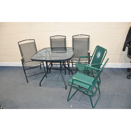 1115 - A HOMEBASE GLASS TOPPED GARDEN TABLE with three matching chairs and two other folding chairs