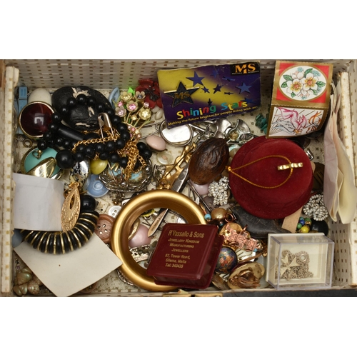 102 - A LARGE ASSORTMENT OF COSTUME JEWELLERY, to include brooches, necklaces, clip on earrings, a selecti... 