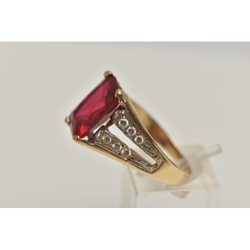 11 - A SYNTHETIC RUBY AND DIAMOND DRESS RING, designed as a central rectangular synthetic ruby in a four ... 