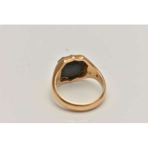 13 - A 1920'S 15CT GOLD BLOODSTONE SIGNET RING, set with a central shield shape bloodstone to the tapered... 