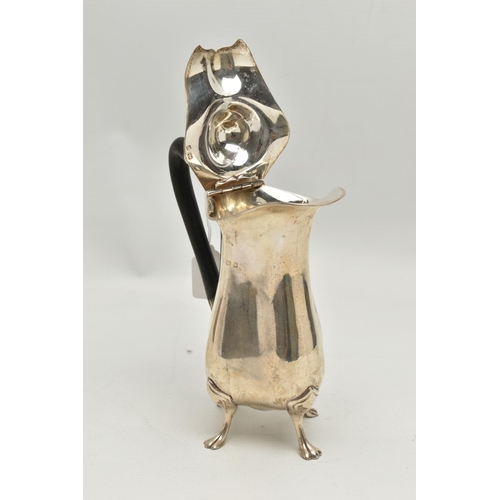 157 - AN EDWARDIAN SILVER HOT WATER JUG OF QUATREFOIL FORM, ebonised handle, on four cabriole legs with pa... 