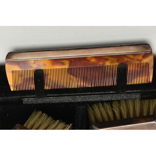 162 - TWO MID 20TH CENTURY CASED SILVER MOUNTED BRUSH AND COMB SETS, comprising a case containing a pair o... 