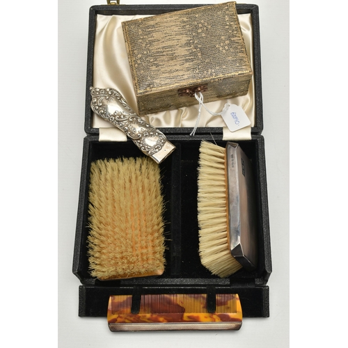 162 - TWO MID 20TH CENTURY CASED SILVER MOUNTED BRUSH AND COMB SETS, comprising a case containing a pair o... 