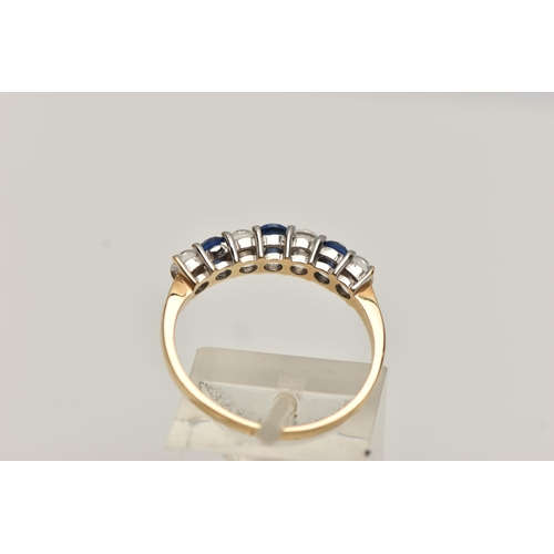 24 - A 14CT GOLD GEM SET RING, three circular cut sapphires and four circular cut cubic zirconia, prong s... 