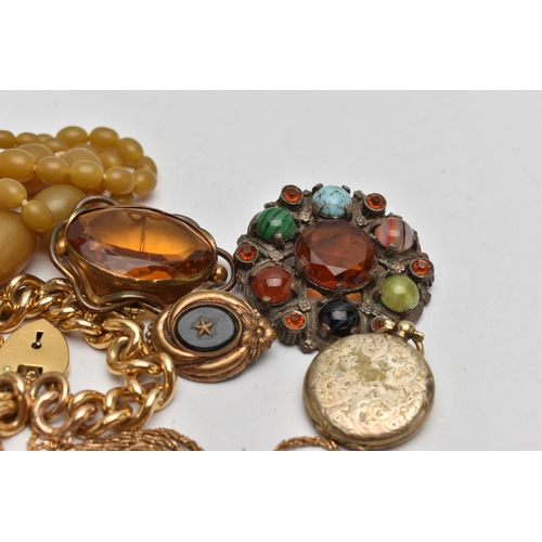 48 - A BAG OF EARLY TO MID 20TH CENTURY JEWELLERY, to include a gold plated onyx brooch, unmarked, a larg... 