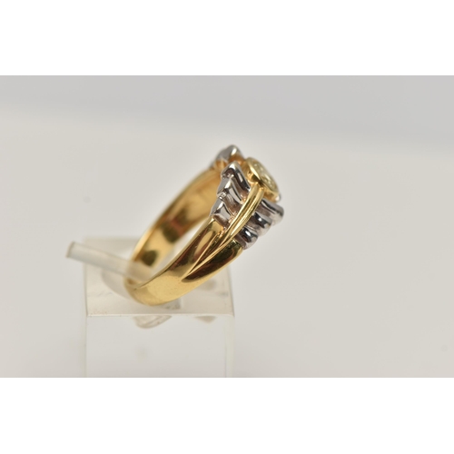 6 - A YELLOW DIAMOND RING, designed as a round brilliant yellow diamond within a collet setting to the t... 