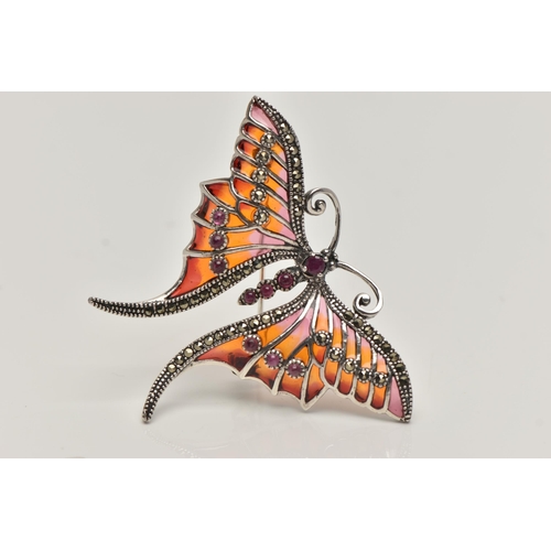 64 - A WHITE METAL PLIQUE A JOUR BROOCH, in the form of a butterfly marcasite and ruby cabcohon detail to... 