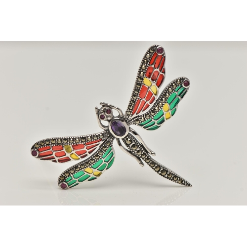 67 - A WHITE METAL PLIQUE A JOUR BROOCH, in the form of a dragonfly, marcasite detailed body with a centr... 