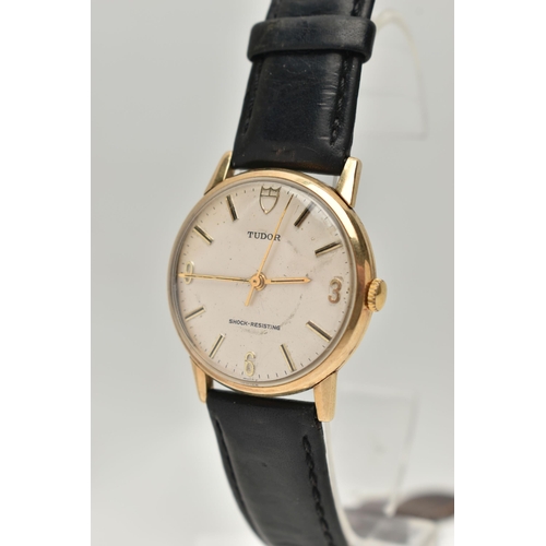 77 - A GENTS 9CT GOLD 'TUDOR' WRISTWATCH, manual wind, round silvered dial signed 'Tudor Shock-Resisting'... 