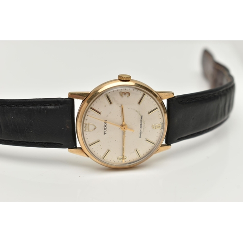 77 - A GENTS 9CT GOLD 'TUDOR' WRISTWATCH, manual wind, round silvered dial signed 'Tudor Shock-Resisting'... 