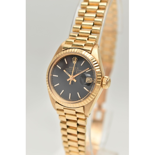 79 - A 1976 ROLEX OYSTER PERPETUAL 26MM DATE WRISTWATCH, ref. 6917, black dial with baton markers and dat... 