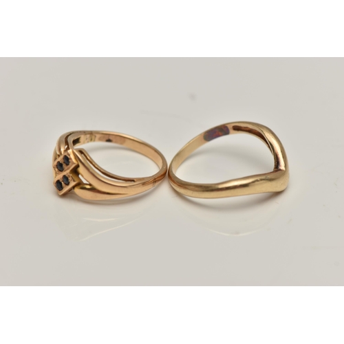 9 - TWO RINGS, the first a V-shape band, ring size M, the second a bifurcated design set with four small... 