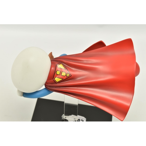 342 - DOUG HYDE (BRITISH 1972), 'Is it a Bird, is it a Plane?' a cold cast porcelain sculpture of a boy an... 