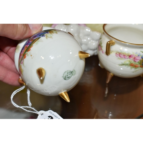 362 - TWO LATE 19TH CENTURY ROYAL WORCESTER CAULDRONS AND A BELLEEK STYLE PORCELAIN SHELL BASKET, the two ... 