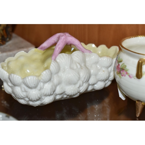 362 - TWO LATE 19TH CENTURY ROYAL WORCESTER CAULDRONS AND A BELLEEK STYLE PORCELAIN SHELL BASKET, the two ... 