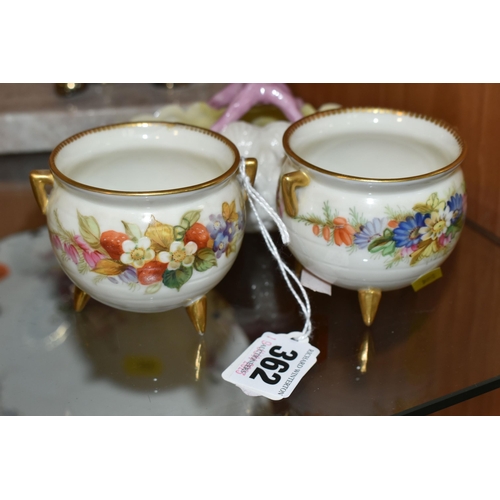 362 - TWO LATE 19TH CENTURY ROYAL WORCESTER CAULDRONS AND A BELLEEK STYLE PORCELAIN SHELL BASKET, the two ... 