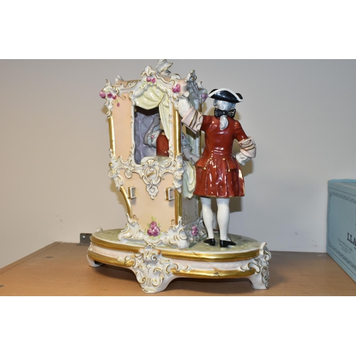 368 - A ROYAL DUX SEDAN CHAIR FIGURE GROUP, modelled with a lady inside the sedan chair and two men and a ... 