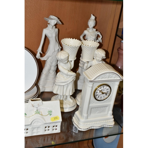 372 - A GROUP OF BELLEEK, COALPORT AND WEDGWOOD CERAMICS, comprising a Belleek mantel clock with quartz mo... 