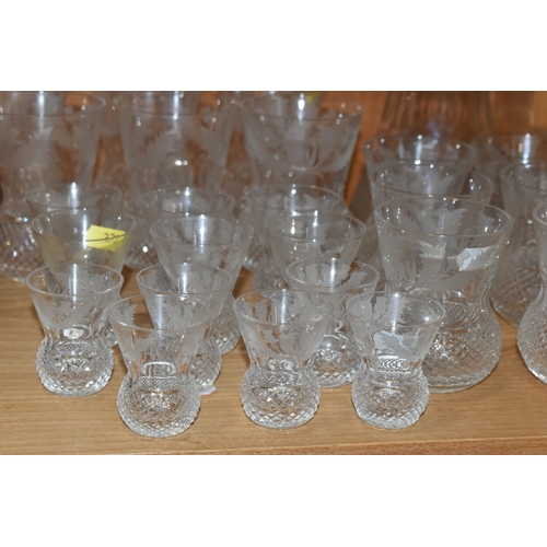 373 - A SUITE OF TWENTY FOUR EDINBURGH CRYSTAL THISTLE PATTERN DRINKING GLASSES AND MATCHING DECANTER, the... 