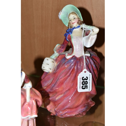 385 - THREE ROYAL DOULTON FIGURINES AND A CHARACTER JUG, comprising Autumn Breezes HN1934 (chipped and hav... 