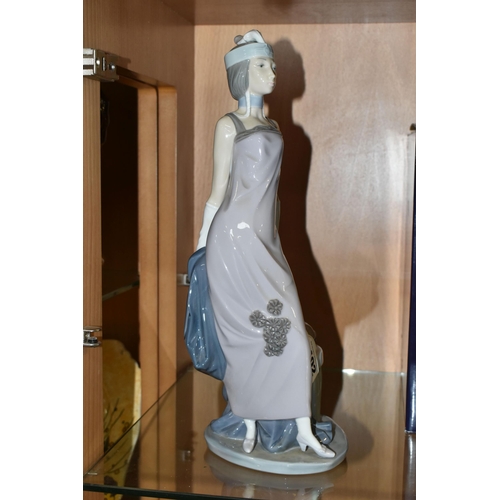 402 - A BOXED LLADRO FIGURE, 5174 an art deco style figure of a woman titled Dama Cuplé, height 34cm (1 + ... 