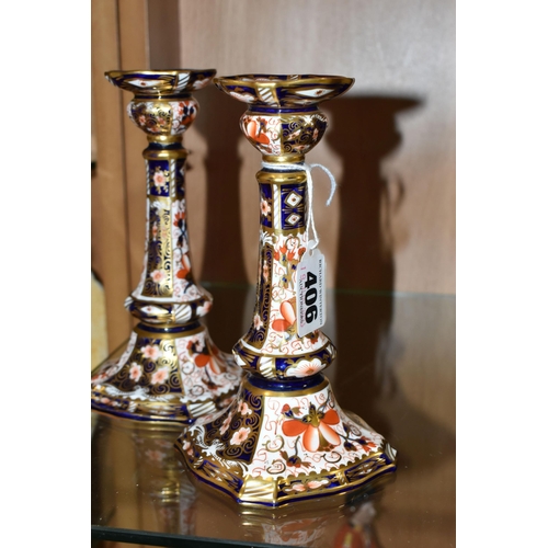 406 - A PAIR OF ROYAL CROWN DERBY IMARI PATTERN CANDLE STICKS, square based, pattern number 2451, date cyp... 