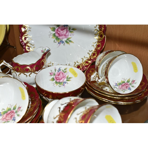 419 - AN AYNSLEY 2418 PATTERN TEA SET, decorated with a pink rose and forget-me-nots with a burgundy and g... 