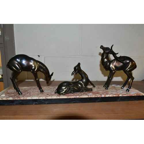 422 - A FRENCH ART DECO FIGURINE OF THREE DEER ON A MARBLE PLINTH, length 55cm x height 23cm (1)