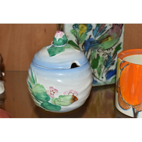 426 - TWO PIECES OF NEWPORT POTTERY CLARICE CLIFF DESIGNS, comprising a 'Water Lily' preserve pot, a 'Biza... 