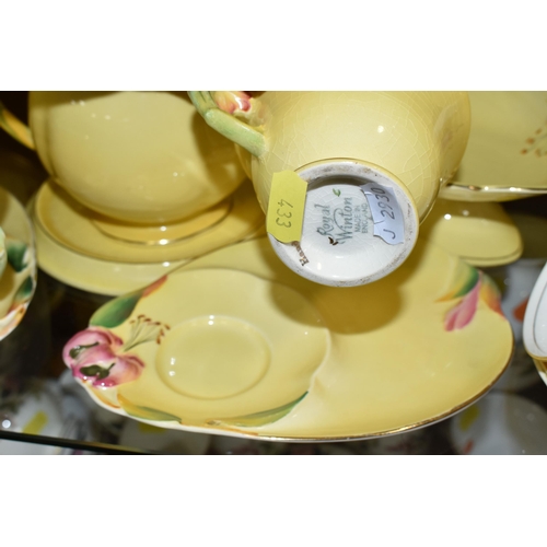 433 - A QUANTITY OF ROYAL WINTON  YELLOW 'PETUNIA' DESIGN TEA WARE, comprising two tennis sets (one cup so... 