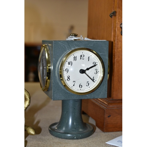 438 - TWO CLOCKS, comprising a stone cased, cube shaped Daymaster clock, with thermometer, barometer and h... 