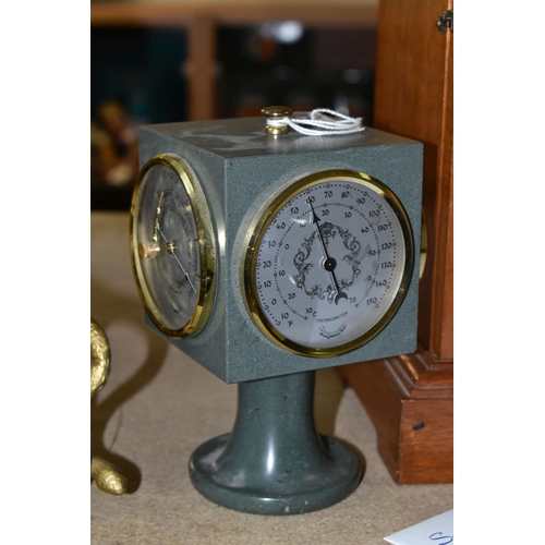 438 - TWO CLOCKS, comprising a stone cased, cube shaped Daymaster clock, with thermometer, barometer and h... 