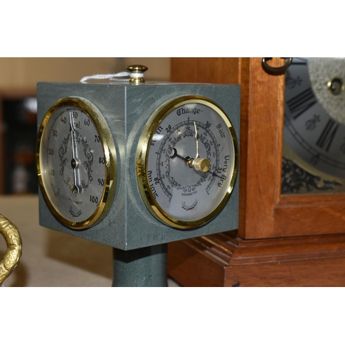 438 - TWO CLOCKS, comprising a stone cased, cube shaped Daymaster clock, with thermometer, barometer and h... 