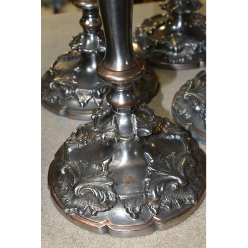 440 - FOUR SILVER PLATED CANDLESTICKS, two pairs of plated copper candlesticks with extinguishers, weighte... 