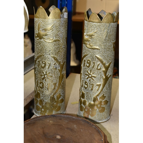 441 - THREE PIECES OF TRENCH ART, comprising a pair of vases decorated with flowers and '1916-1917', heigh... 