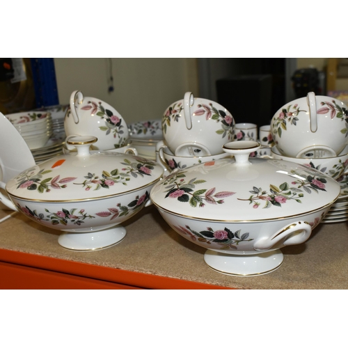 442 - A ONE HUNDRED AND SIX PIECE WEDGWOOD HATHAWAY ROSE DINNER SERVICE, comprising three tureens (one mis... 