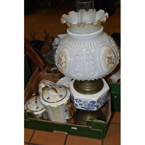 449 - TWO BOXES OF CERAMICS, GLASS WARES AND LAMP, to include an oil lamp with ceramic Willow pattern rese... 