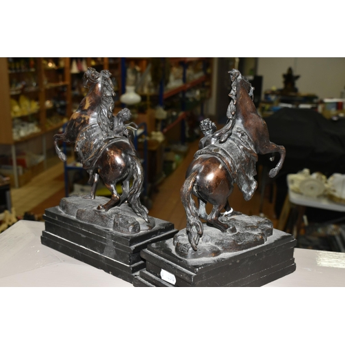 475 - A PAIR OF SPELTER 'MARLEY HORSES' FIGURES, on black slate plinths (2) (Condition report: one figure ... 