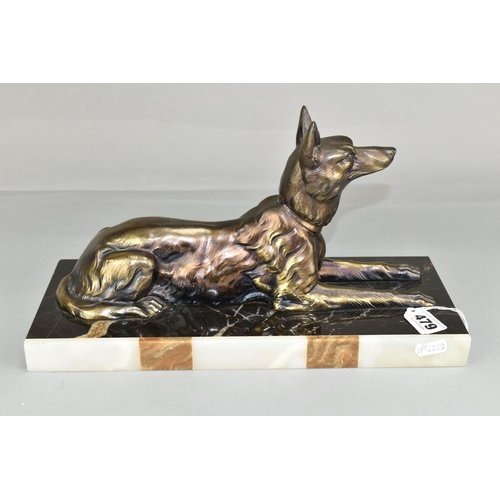 479 - A FRENCH ART DECO STATUE OF AN ALSATIAN DOG, on a stylised marble plinth (1) (Condition report: a fe... 